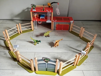 Dinoland 26-piece dinosaur enclosure wooden toy creative play