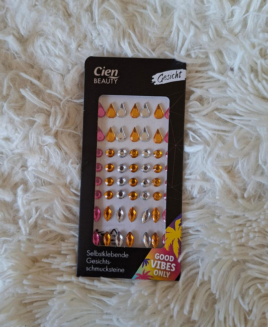 Cien beauty face gems for a colorful festival look